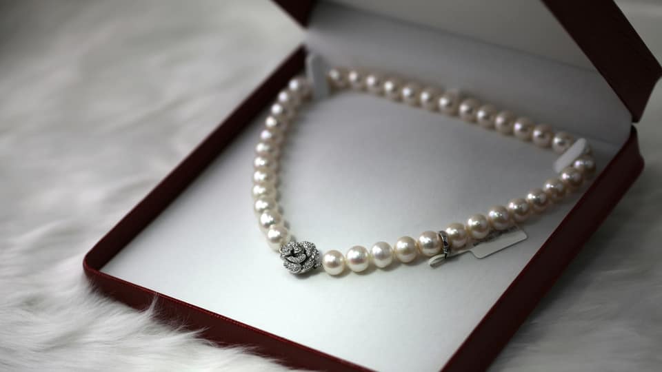 Jewellery pieces on a neutral ground