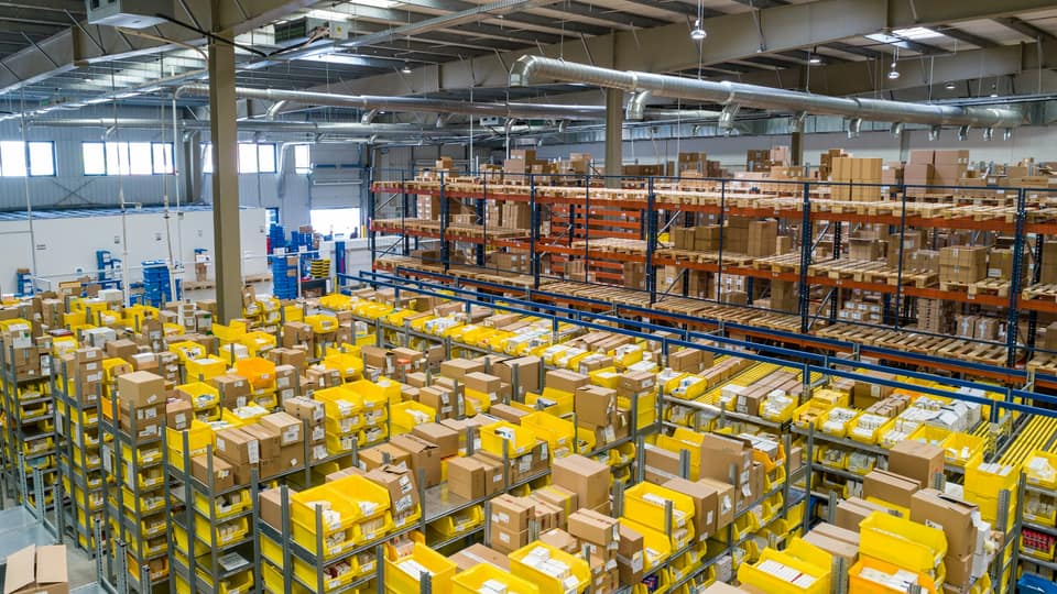 Inventory aisles under controlled lighting